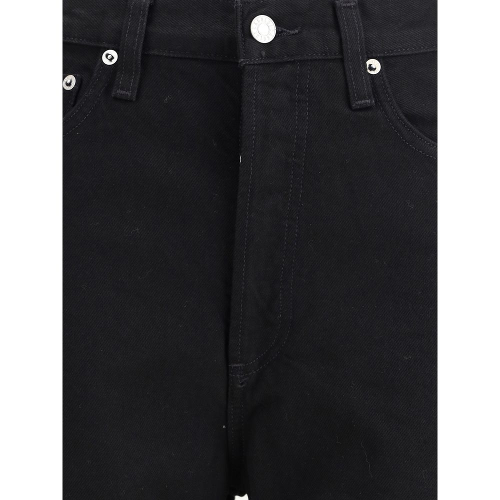 Close-up of Agolde Black Recycled Cotton High-Waisted Jean with button and pocket details, showcasing modern tailored design.