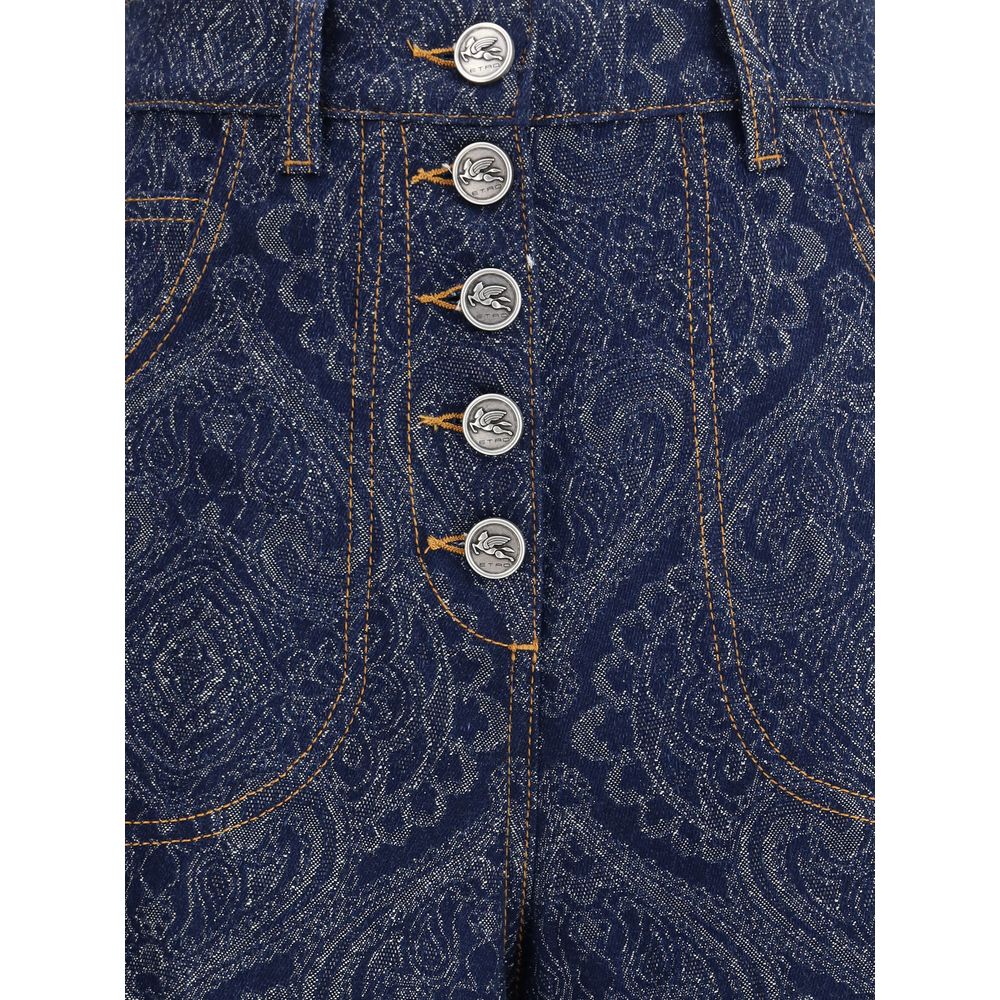Close-up of Etro Blue Cotton Flared Jeans with abstract jacquard pattern and Pegaso buttons.