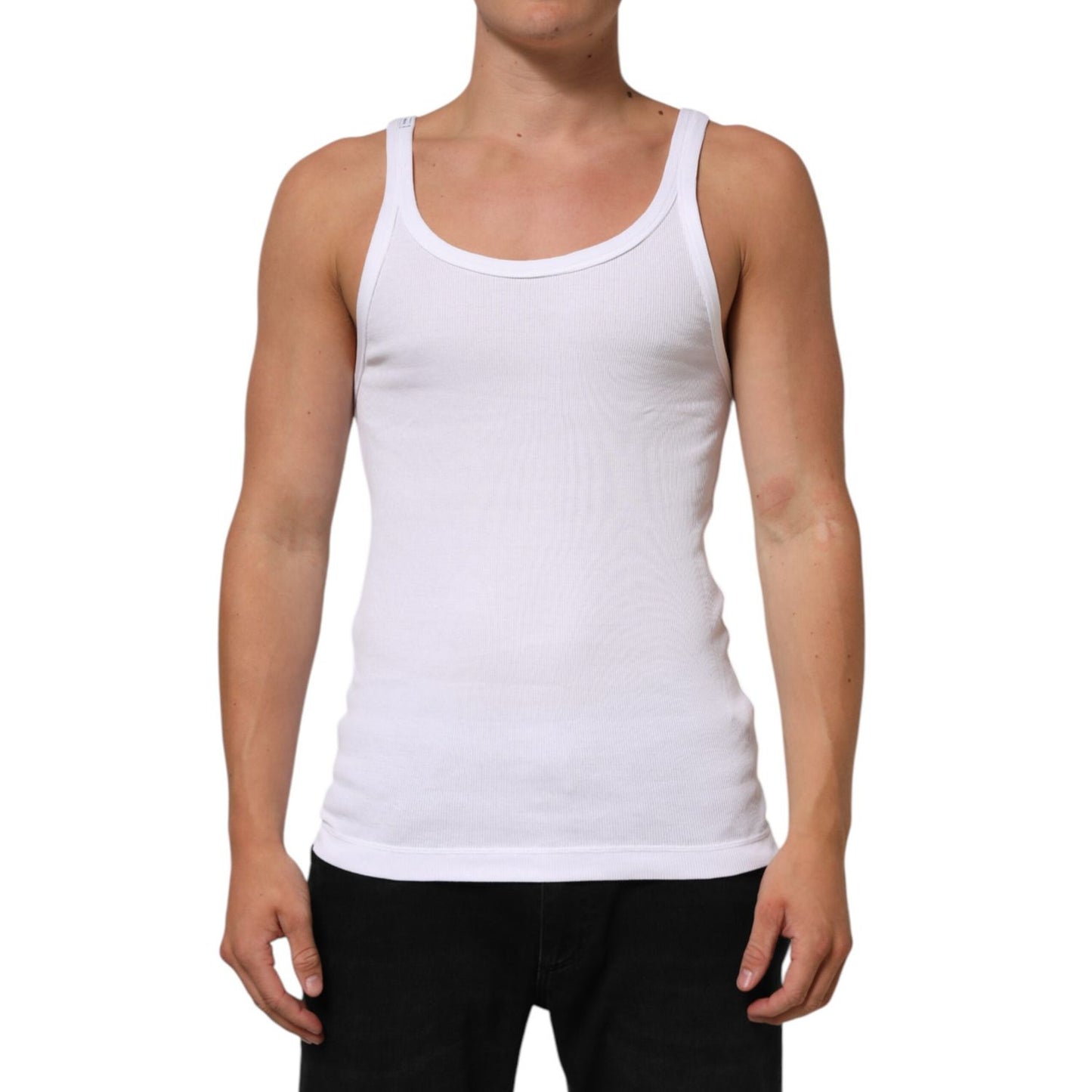 Dolce & Gabbana White Sleeveless Round Neck Tank Top T-shirt in cotton with regular fit and logo details, modeled on a person.