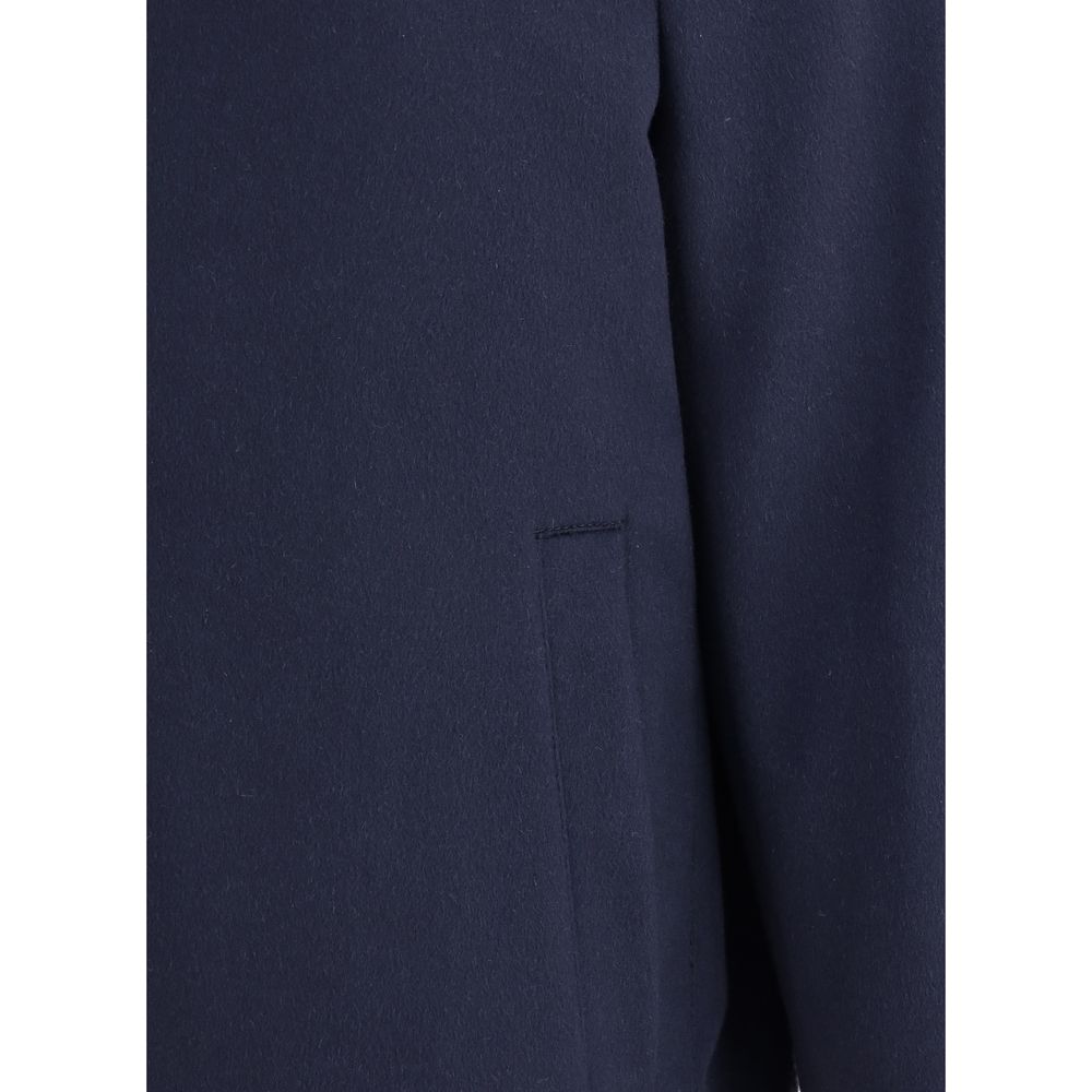 Close-up of Brunello Cucinelli Blue Cashmere Bomber sleeve, showcasing fine stitching and elegant monochrome design for a modern look.