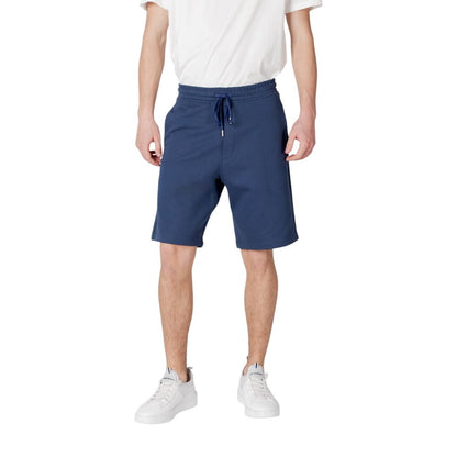 Model wearing Replay Blue Cotton Bermuda Shorts with elastic waistband and drawstring.
