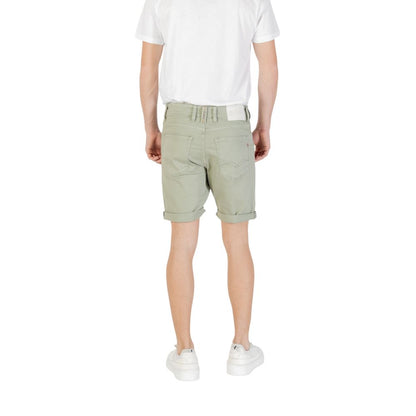 Model wearing Replay Green Cotton Bermuda Shorts, back view, showcasing summer style and comfort.