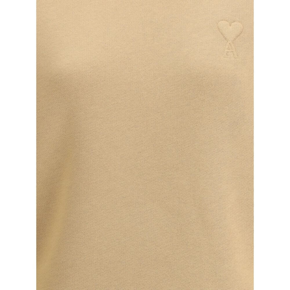 Ami Paris Beige Cotton Sweatshirt featuring the iconic Ami de Coeur embossed logo on soft brushed cotton, offering comfort and style.