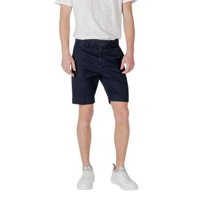Antony Morato Blue Cotton Bermuda Shorts in slim fit, modeled by a man, casual summer wear with rubber logo detail.