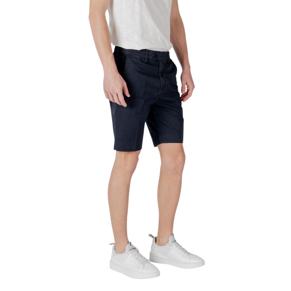 Antony Morato Blue Cotton Bermuda Shorts modeled front view, showcasing slim fit design and modern logo detail, ideal for summer style.