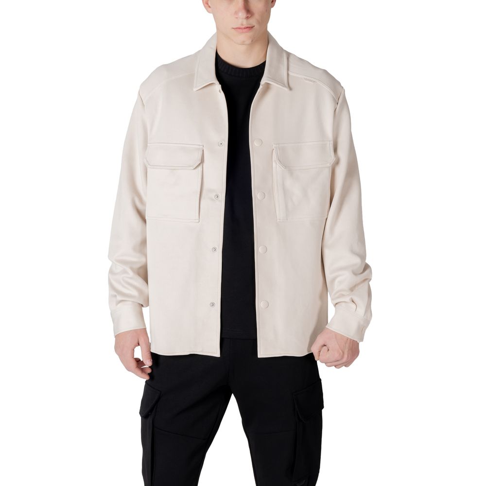 Antony Morato Cream Cotton Sweatshirt with rubber flag logo, shown on a model wearing black pants, showcasing modern design and comfort.