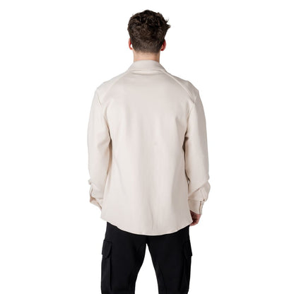 Back view of a man wearing an Antony Morato Cream Cotton Sweatshirt, showcasing its regular fit and contemporary design.