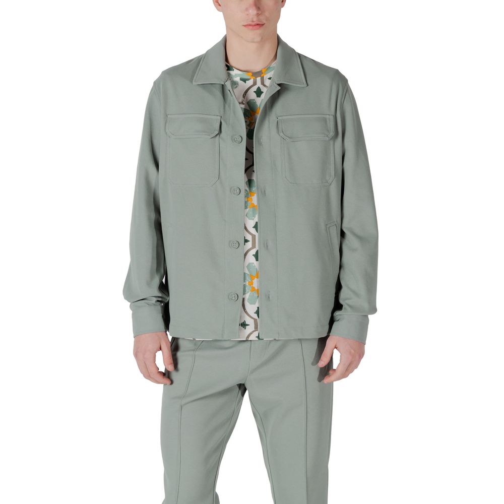 Model wearing Antony Morato green polyester shirt with matching pants, showcasing elegant straight fit design.