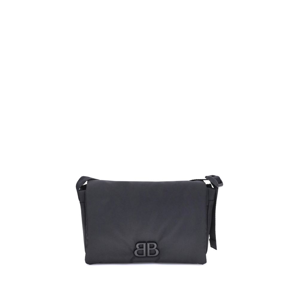 Balenciaga Black Polyamide Shoulder Bag with logo, magnetic closure, and adjustable strap. Elegant minimalist design, front view.