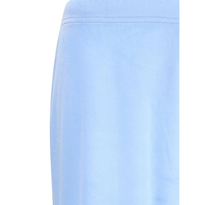 Close-up of Balenciaga Light Blue Triacetate Casual Pants, showcasing bistretch velvet texture and low elasticated waist.