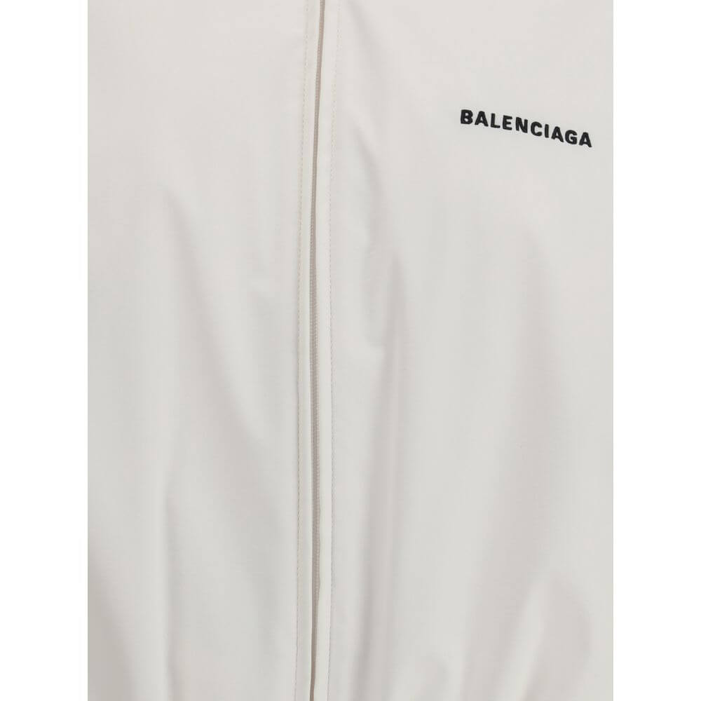 Detailed view of Balenciaga White Polyester Shell Jacket with logo embroidery on chest.