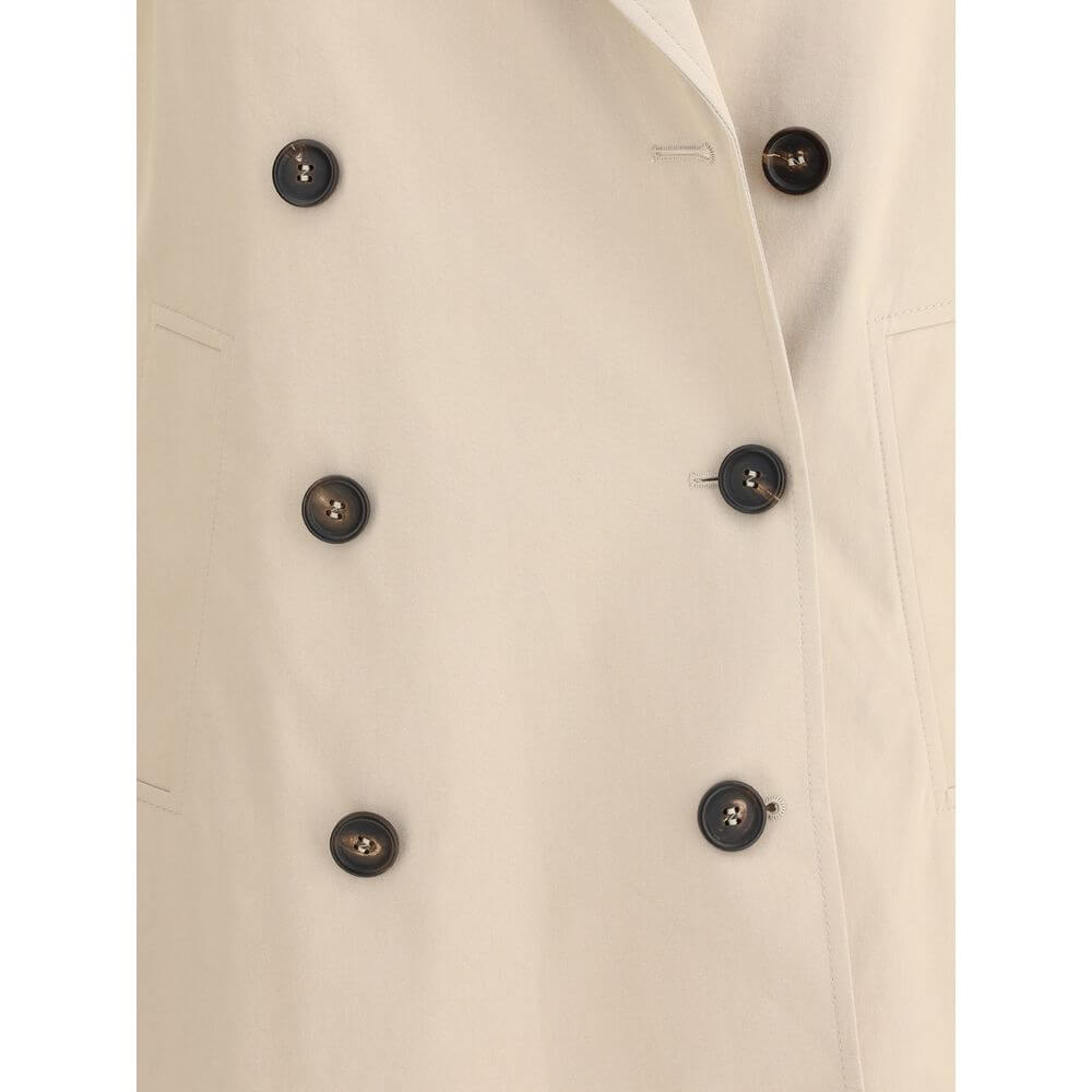 Detail of Brunello Cucinelli Beige Cotton Coat with double-breasted buttons and elegant lapel for AW25 collection.