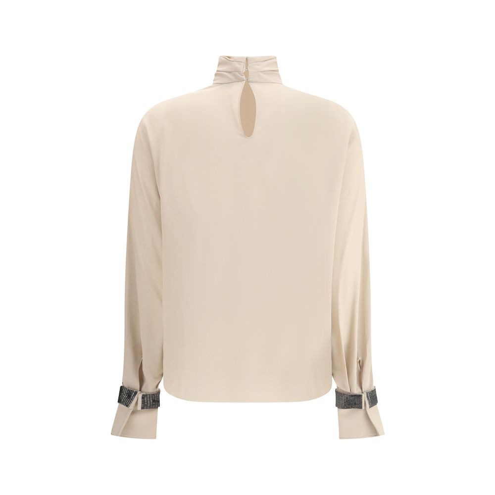 Brunello Cucinelli Beige Silk Blouse with turtleneck, back button closure, jewel embellishments, elegant and lightweight design.