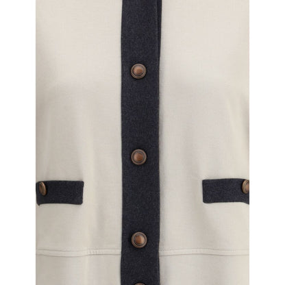 Close-up of Brunello Cucinelli Gray Cotton Cardigan with button closure and welt pockets.