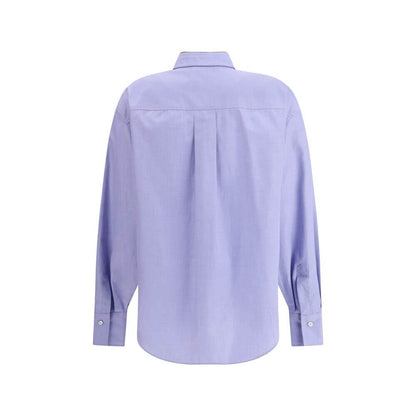 Back view of Brunello Cucinelli Light Blue Cotton Dress Shirt, featuring classic design and asymmetrical hemline for contemporary style.