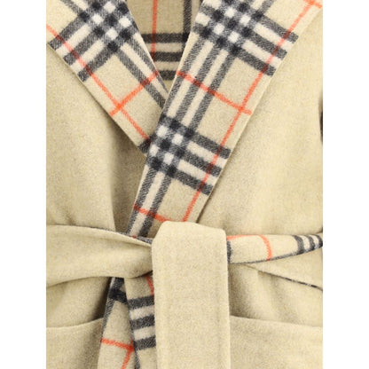 Close-up of Burberry Beige Wool Coat showcasing reversible design with iconic check pattern and wrap-around closure.