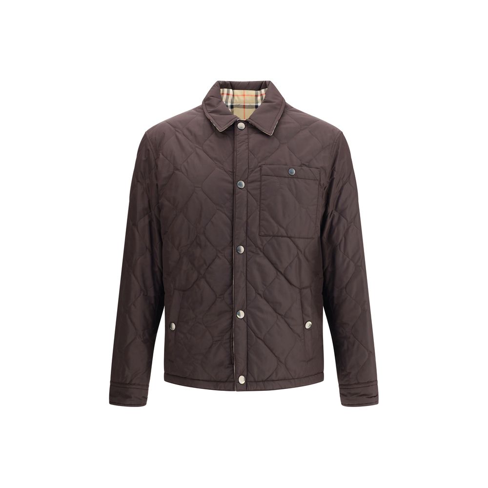 Burberry Brown Polyamide Coat with reversible quilted design, snap button closure, and Burberry Check cotton twill lining.