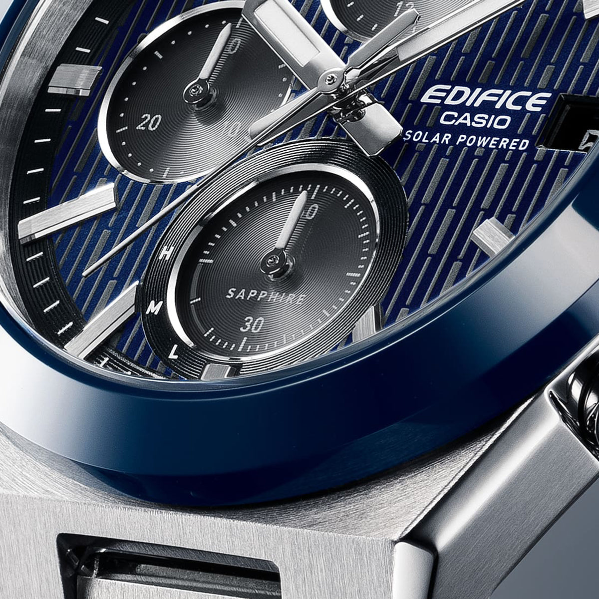 Close-up of CASIO EDIFICE Mod. SOLAR POWERED CHRONOGRAPH - BLUE watch face with chronograph dials and stainless steel case.