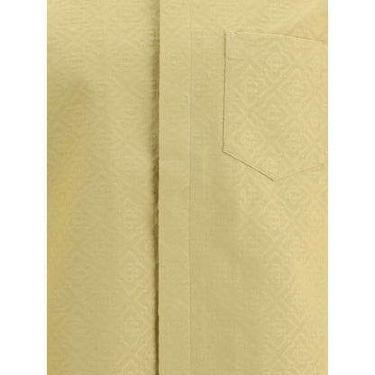 Close-up of Casablanca Cream Cotton Shortsleeve Shirt with jacquard fabric and pocket detail, perfect for warm seasons.