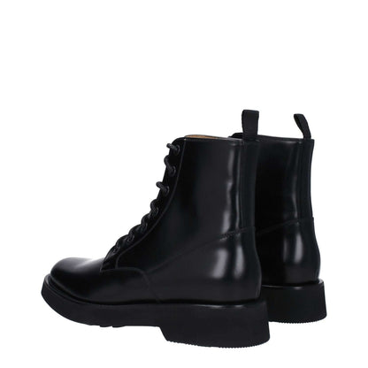 Church's Black Leather Ankle Boots with a lace-up closure, aged effect, and round toe, featuring a rubber sole and low flat heel.