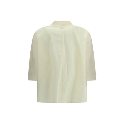 Back view of Cruna Yellow Cotton Blouse with classic collar and 3/4 sleeves, ideal for versatile and elegant styling.