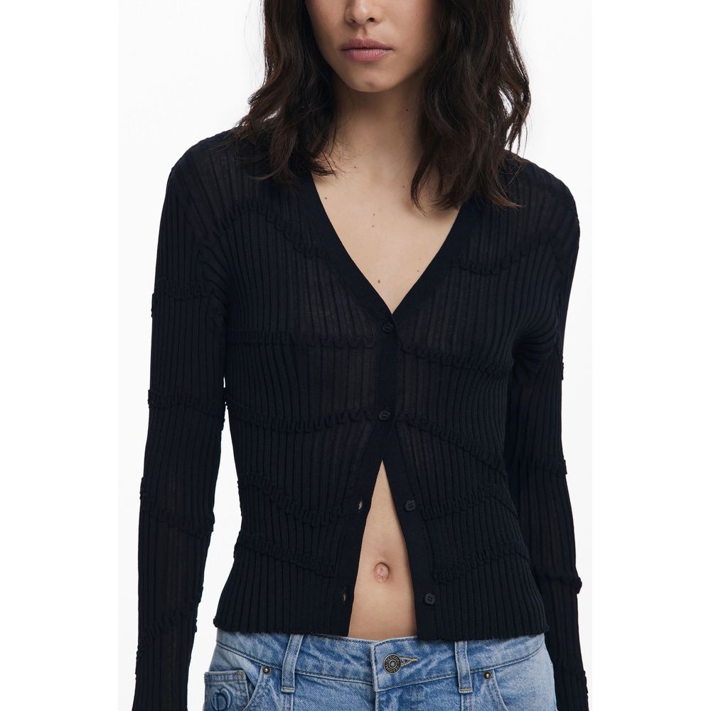 Woman wearing Desigual Black Viscose Women Cardigan with V-neck and 4 buttons, showcasing trendy and luxurious style.