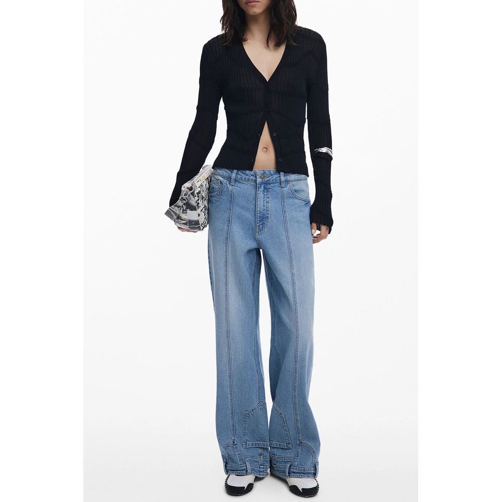 Model wearing Desigual Black Viscose Women Cardigan, featuring chic buttons and trendy style, paired with casual jeans for a stylish look.