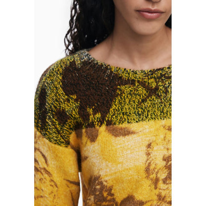 Desigual Yellow Wool Women Sweater with vibrant patterns and crew neck, showcasing a bold style and the Desigual logo.