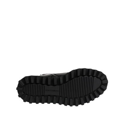 Sole view of Dolce & Gabbana Black Leather Lace Up Mid Calf Boots Shoes showcasing rugged leather outer sole with logo detail.