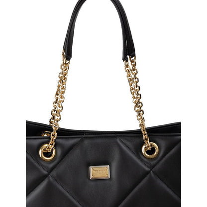 Dolce & Gabbana Black Leather Matelassé Tote Bag with gold chain handles and logo tag, featuring snap closure and internal pockets.