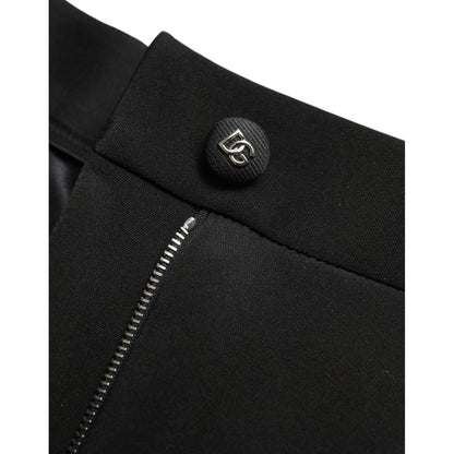 Close-up of Dolce & Gabbana Black Wool Stretch High Waist Skinny Pants with zipper and logo detail.