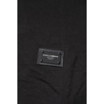 Close-up of Dolce & Gabbana Dark Gray Logo Plaque Cotton Men Polo Shirt T-shirt showing logo plaque detail.