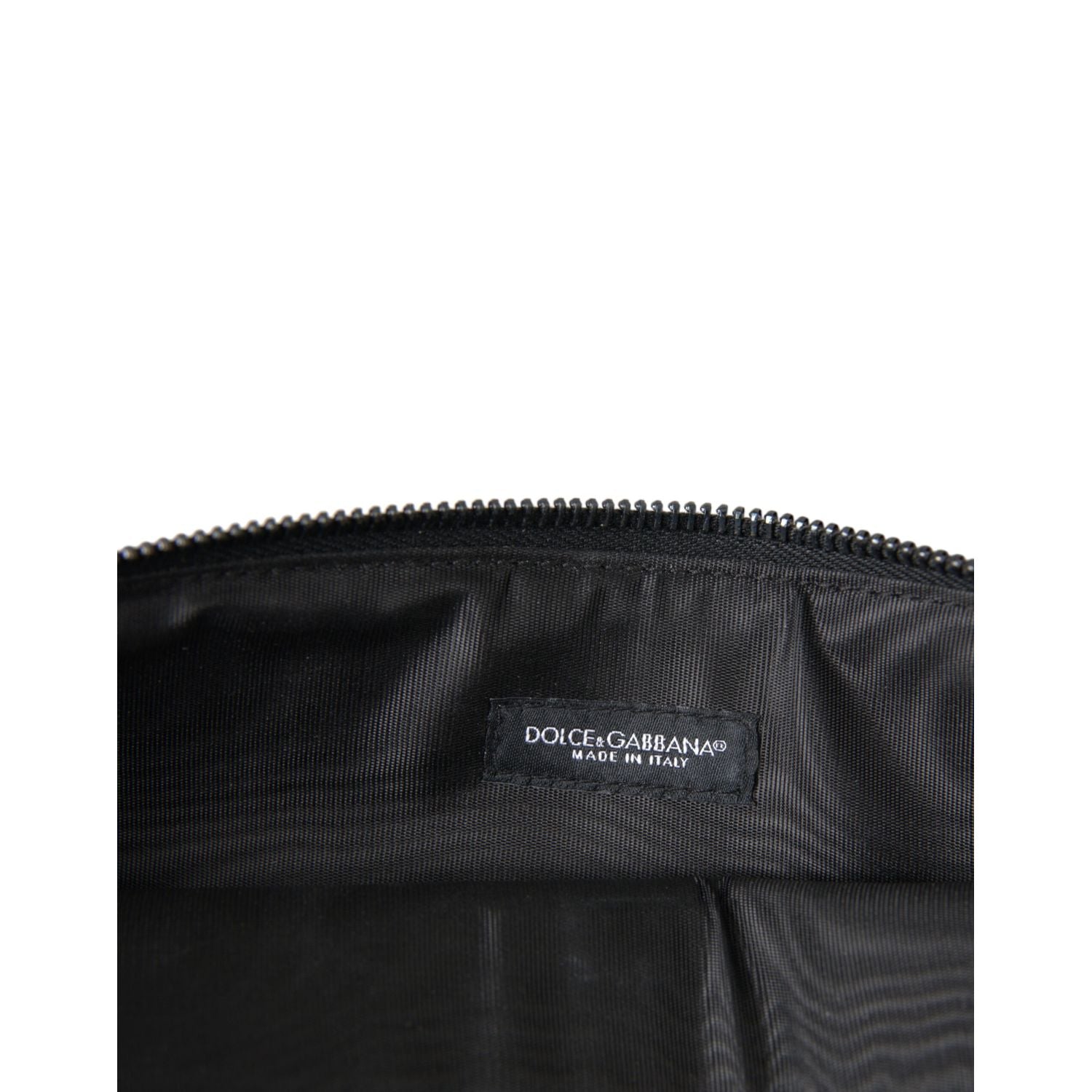 Front view with bag zipped and handles upright.
