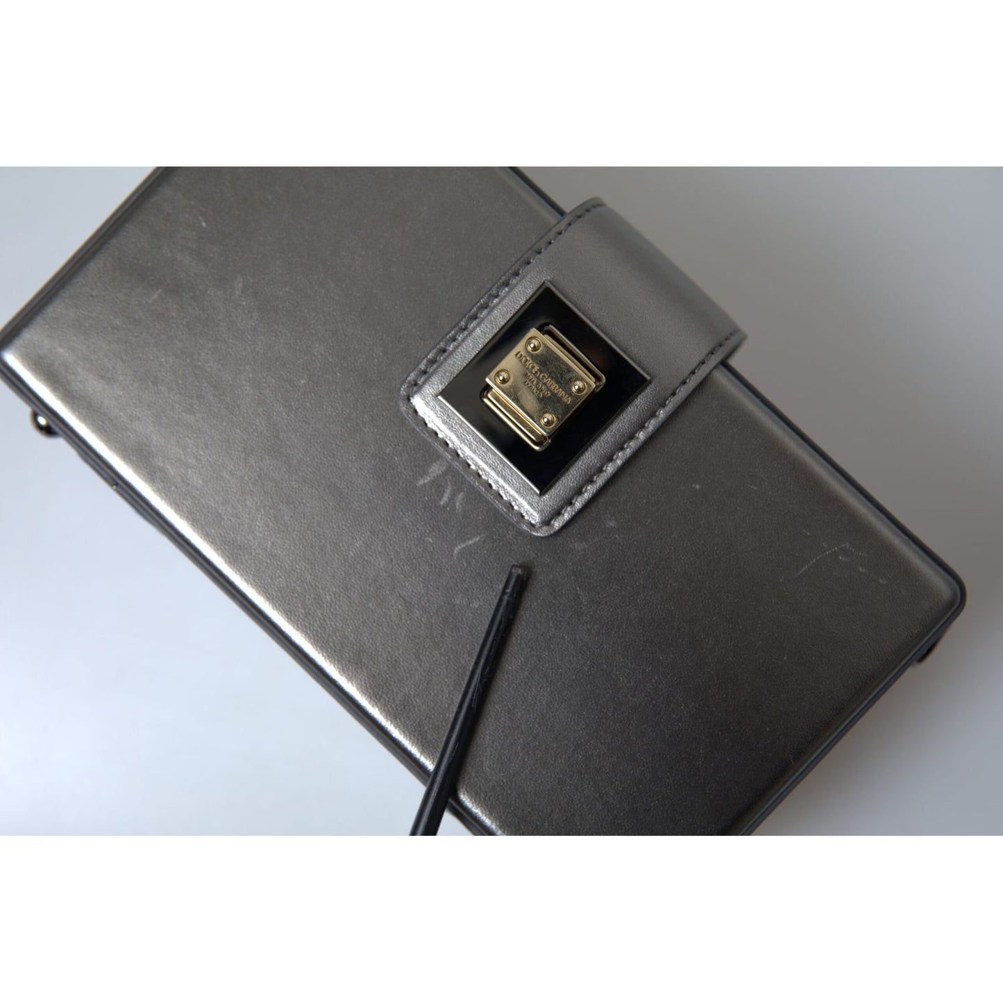 Dolce & Gabbana Steel Gray Leather Box Shape Shoulder Gold DG Logo Plaque Bag with polished gold-tone hardware and flap closure.