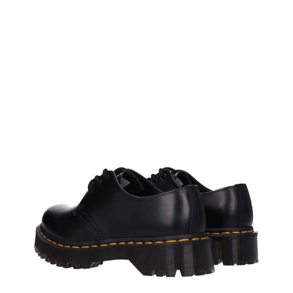 Dr. Martens Black Leather Oxfords And Derbies with lace up design, rubber sole, 3.5 cm mid heel, casual style, round toe, rear view.