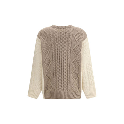 Ella Cream Cashmere Cashmere Sweater with two-tone cable-knit design and ribbed crewneck, highlighting texture and sophistication.