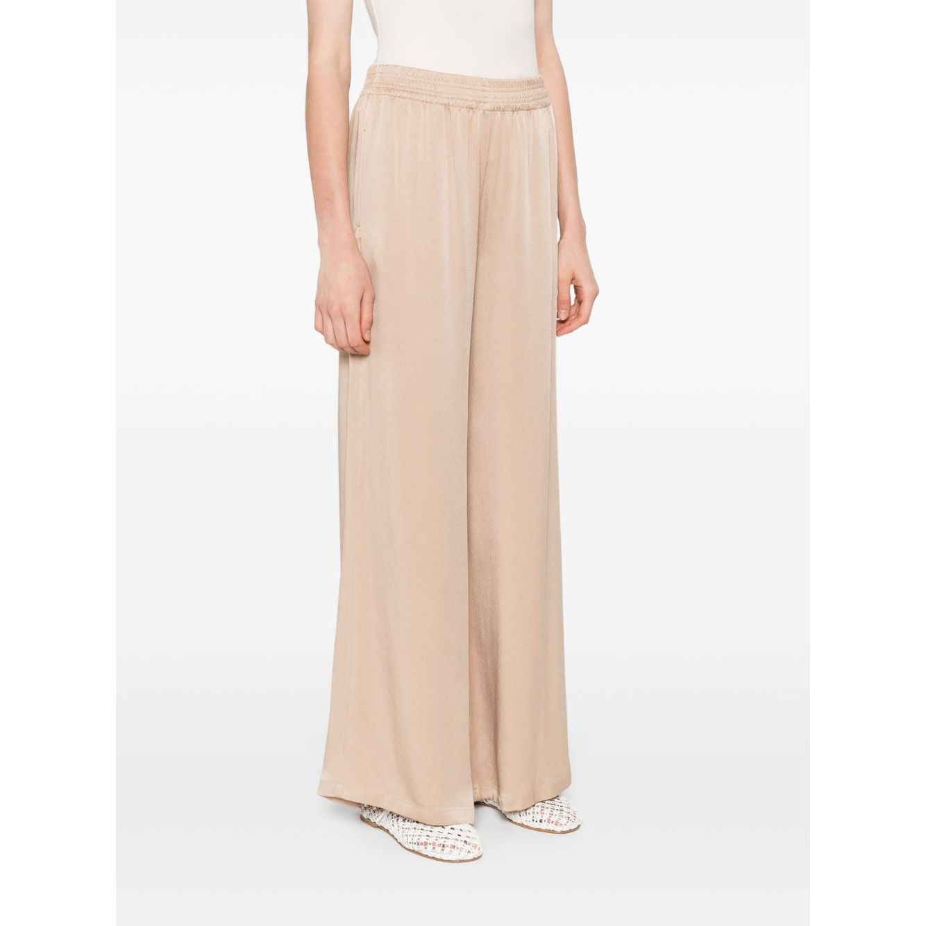 Fabiana Filippi Trousers Powder - beige wide-leg trousers with elasticated waist and side pockets, perfect fit, showcased by model.