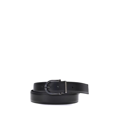 Ferragamo Black Calf Leather Bos Taurus Belt with reversible two-tone design and geometric buckle.