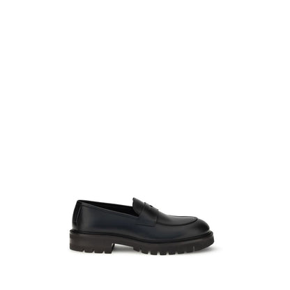 Ferragamo Black Rubber Slip-On Loafers with brushed calfskin upper and bold lug sole