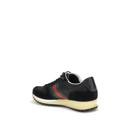 Gucci Black Polyamide Athletic Sneakers with green and red Web stripe, suede trim, and rubber sole, showcasing brand’s iconic style.