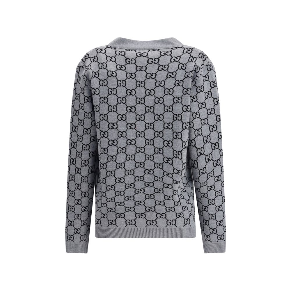 Gucci Black Wool Cardigan featuring GG Supreme pattern in black and white, V-neckline, long sleeves, suitable for smart or casual looks.