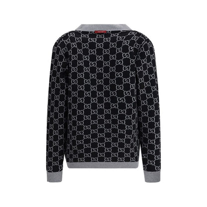 Rear view of Gucci Black Wool Cardigan with GG Supreme pattern, reversible design in black and white wool, featuring ribbed trim.
