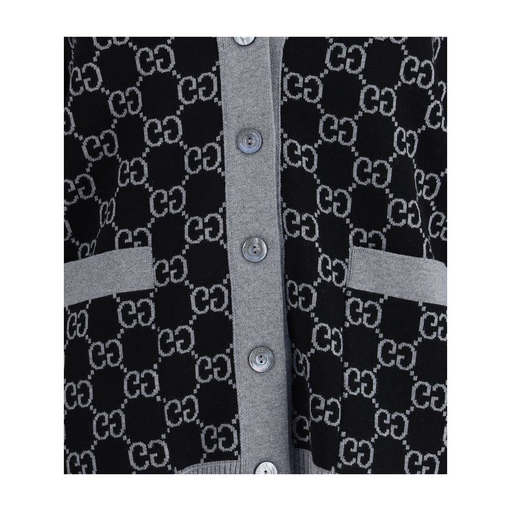 Gucci Black Wool Cardigan with GG Supreme pattern, featuring a V-neck, ribbed trim, and front pockets, ideal for smart or casual looks.