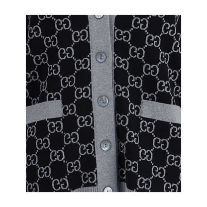 Gucci Black Wool Cardigan with GG Supreme pattern, featuring a V-neck, ribbed trim, and front pockets, ideal for smart or casual looks.
