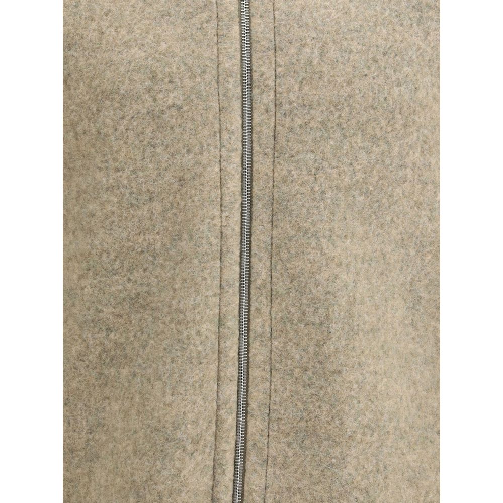 Close-up of Jil Sander Beige Wool Coat with zipper detail and soft texture.