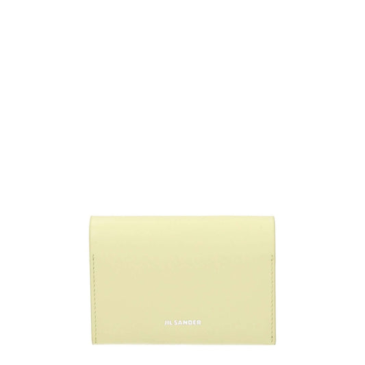 Jil Sander Yellow Leather Cardholder with button closure, 3 card slots, and front logo in lemon yellow leather.