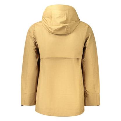Rear view of a tan hooded jacket with minimalist design, showcasing sleek style and functionality.