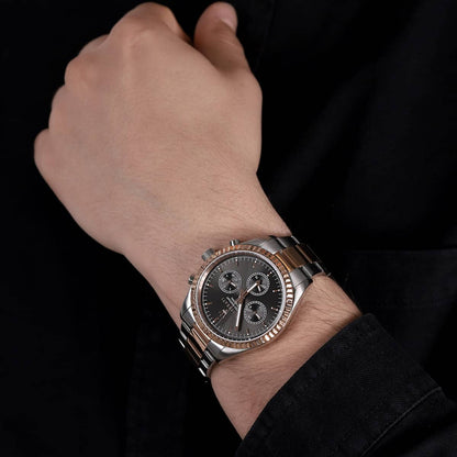 MASERATI MOD. R8853100020 wristwatch on wrist, silver and rose gold two-tone, multifunction quartz movement, 43mm case, 10 ATM water resistant.