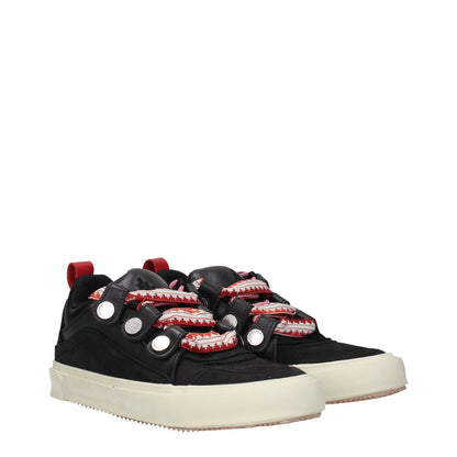 Marcelo Burlon Black Leather Low Top Sneakers with aged effect, front and side logos, lace-up, rubber sole, vintage style elements.