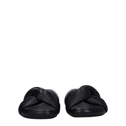 Marni Black Leather Slippers with side logo, open toe, mid heels; crafted in leather with rubber sole. Casual style footwear from Marni.